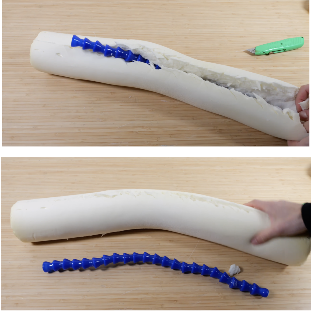 Exposed internal spine inside the Dot&Dot Twist memory foam travel pillow, illustrating the adjustable bendable core that controls shape and support.